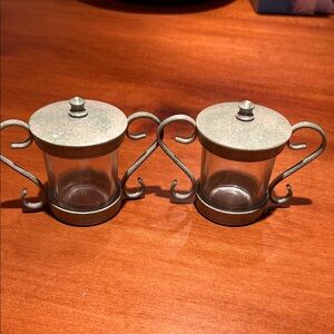 2 matching votive candle holders. Metal and glass. Vintage? Metal is gray green